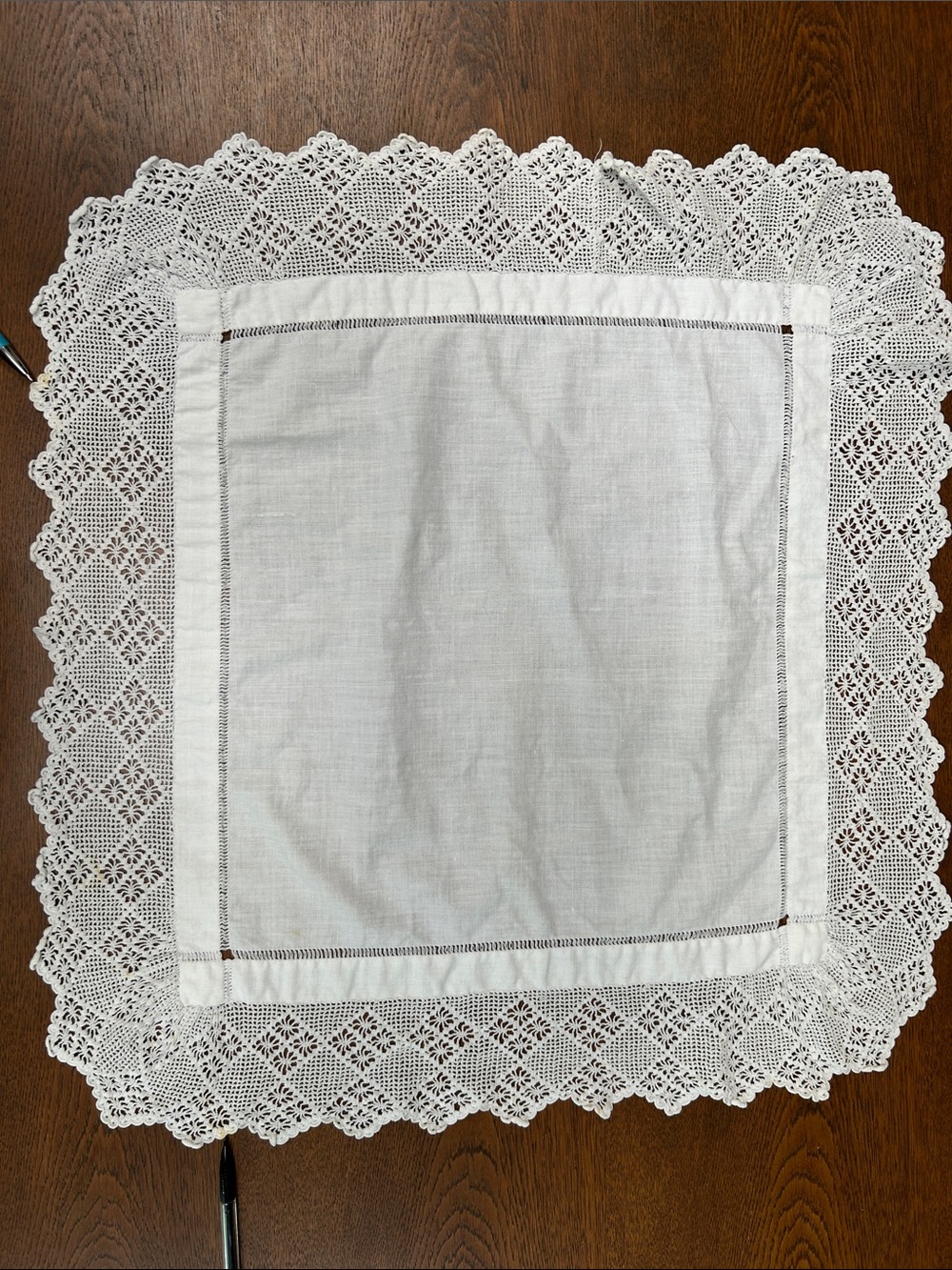 VINTAGE White Lace-Edged Table Linen/Brand Unspecified. 21” sq- table topper.